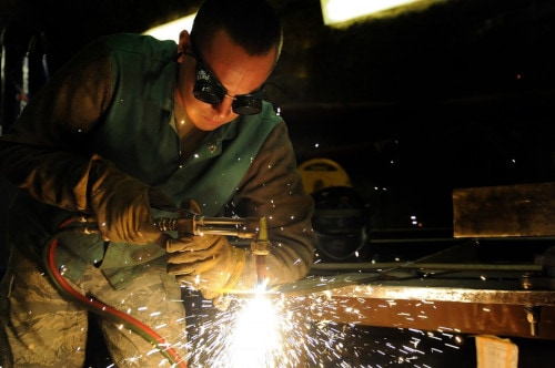 man working on welding