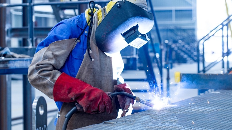 Welding-with-sparks-by-Process-fluxed-cored-arc-welding_YAKISTUDIO_shutterstock