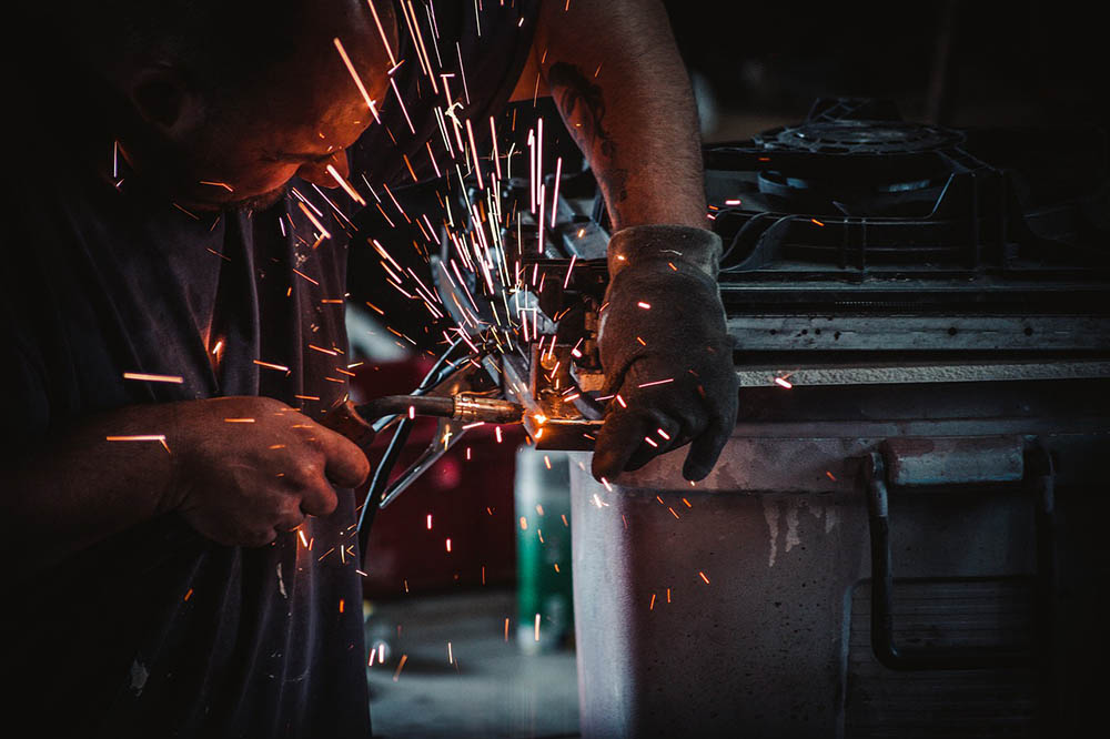 man welding in the factory