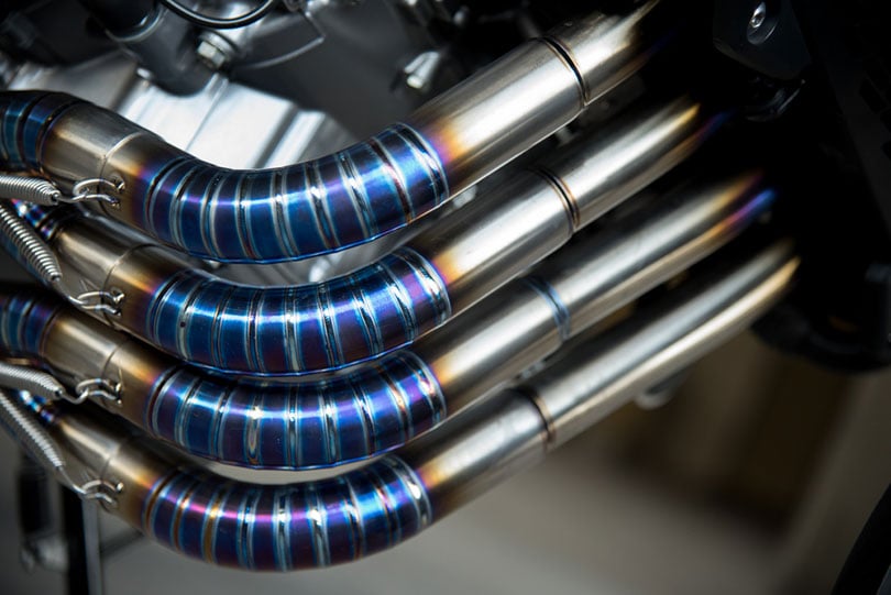 motorcycle exhaust header burning blue titanium welding pipe