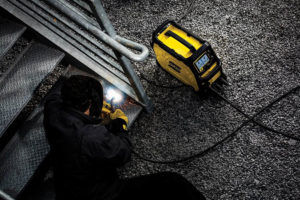 man using ESAB EMP215IC MIG:TIG:Stick Welder