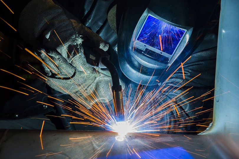 welder using gas metal arc welding